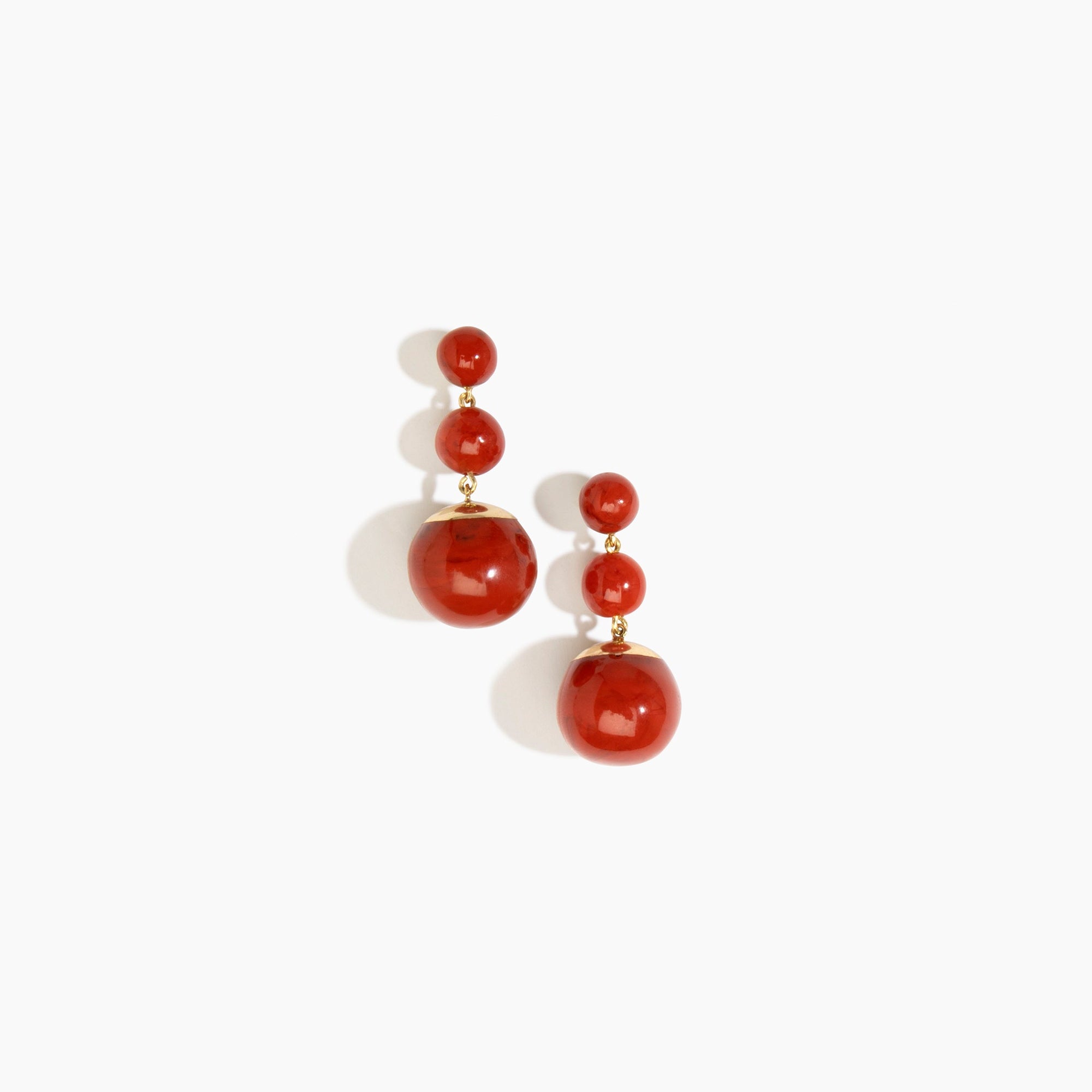 Dinosaur Designs Full Moon Drop Earrings in Lava with Brass — marbled terracotta red resin graduating bead drop earrings with brass fittings..