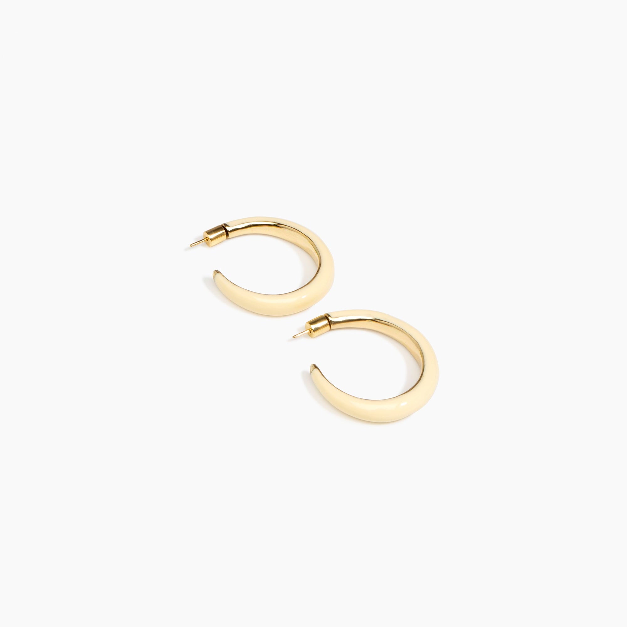Dinosaur Designs Large Pebble Duo Hoop Earrings in Cream — cream resin hoop earrings with polished brass inner face and stud fastening.