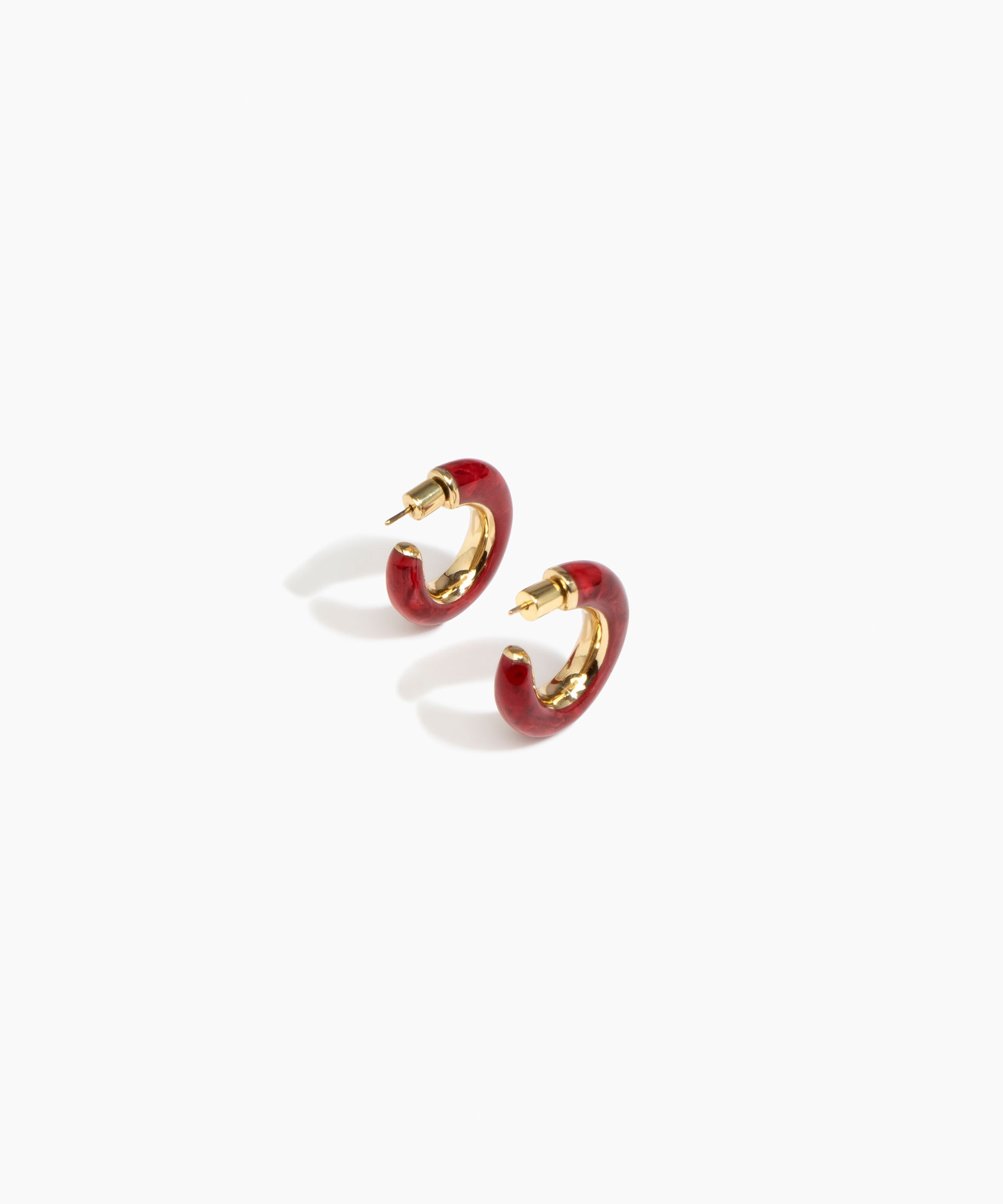 Dinosaur Designs Medium Pebble Duo Hoop Earrings in Cranberry — marbled red resin hoop earrings with polished brass inner face and stud fastening