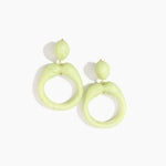 Dinosaur Designs Sprout Hoop Earrings in Pistachio colour — marbled pastel green resin oversized irregular hoop drop earrings with small oval resin stud top and gold-plated hardware