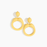 Dinosaur Designs Sprout Hoop Earrings in Pollen colour — marbled yellow resin oversized irregular hoop drop earrings with small oval resin stud top and gold-plated hardware