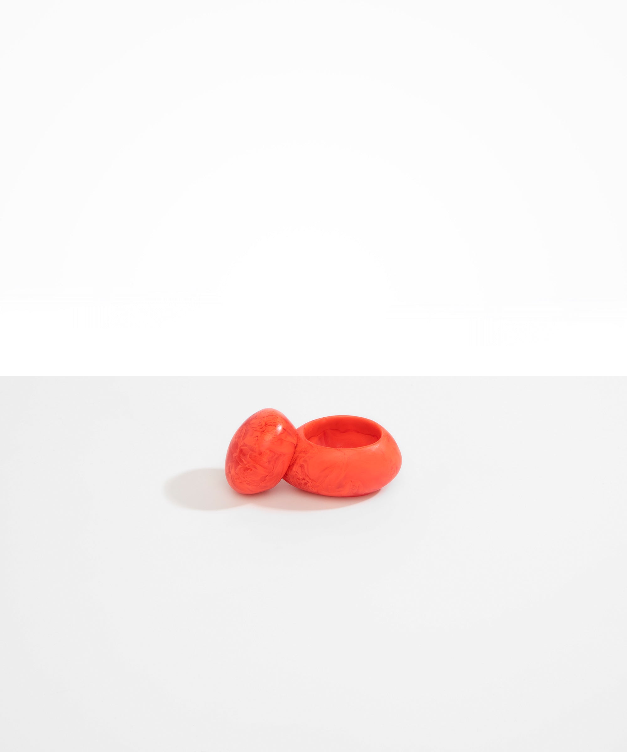 Dinosaur Designs JARPEBMED Medium Pebble Jar in Lychee orange colour resin