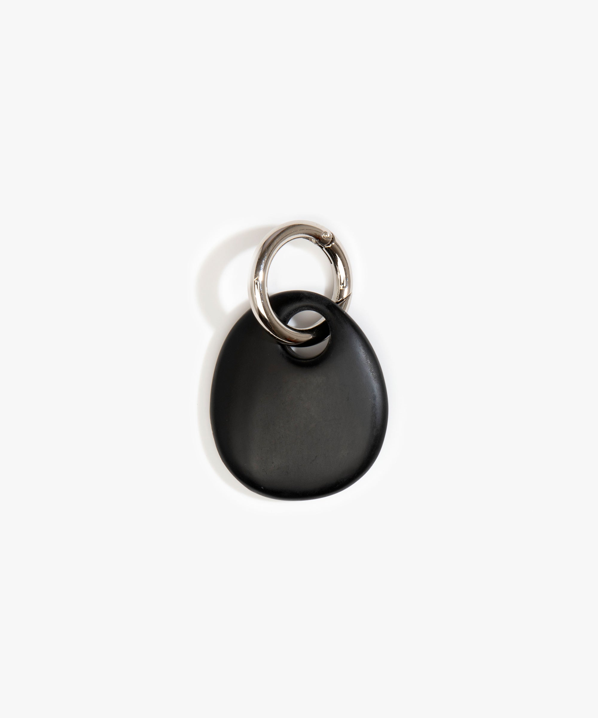 Dinosaur Designs Earth Keyring in Black — handcrafted Black resin pebble bead on a polished gunmetal jump ring..