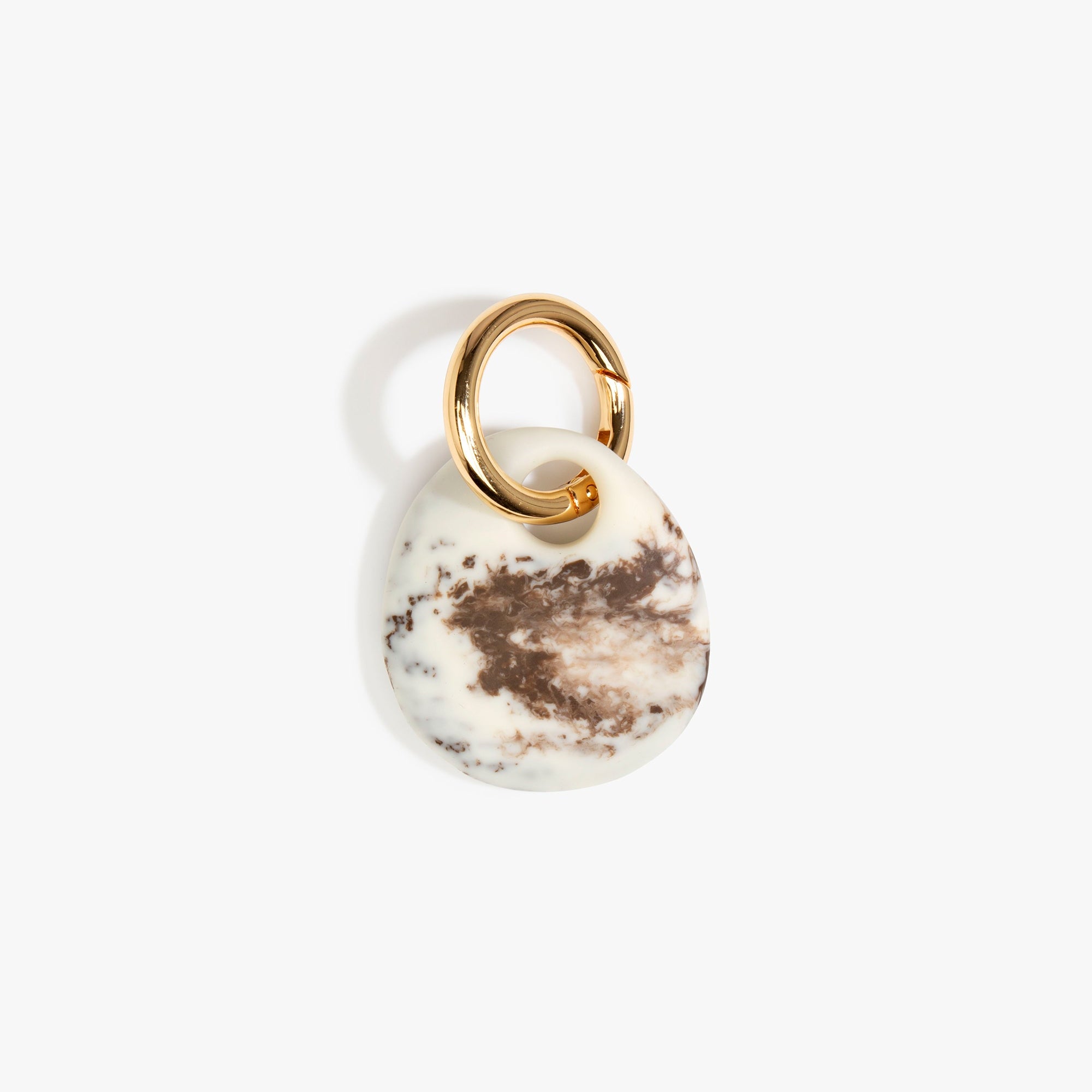 Dinosaur Designs Earth Keyring in Cappuccino — handcrafted marbled brown and Cream resin pebble bead on a polished brass jump ring..