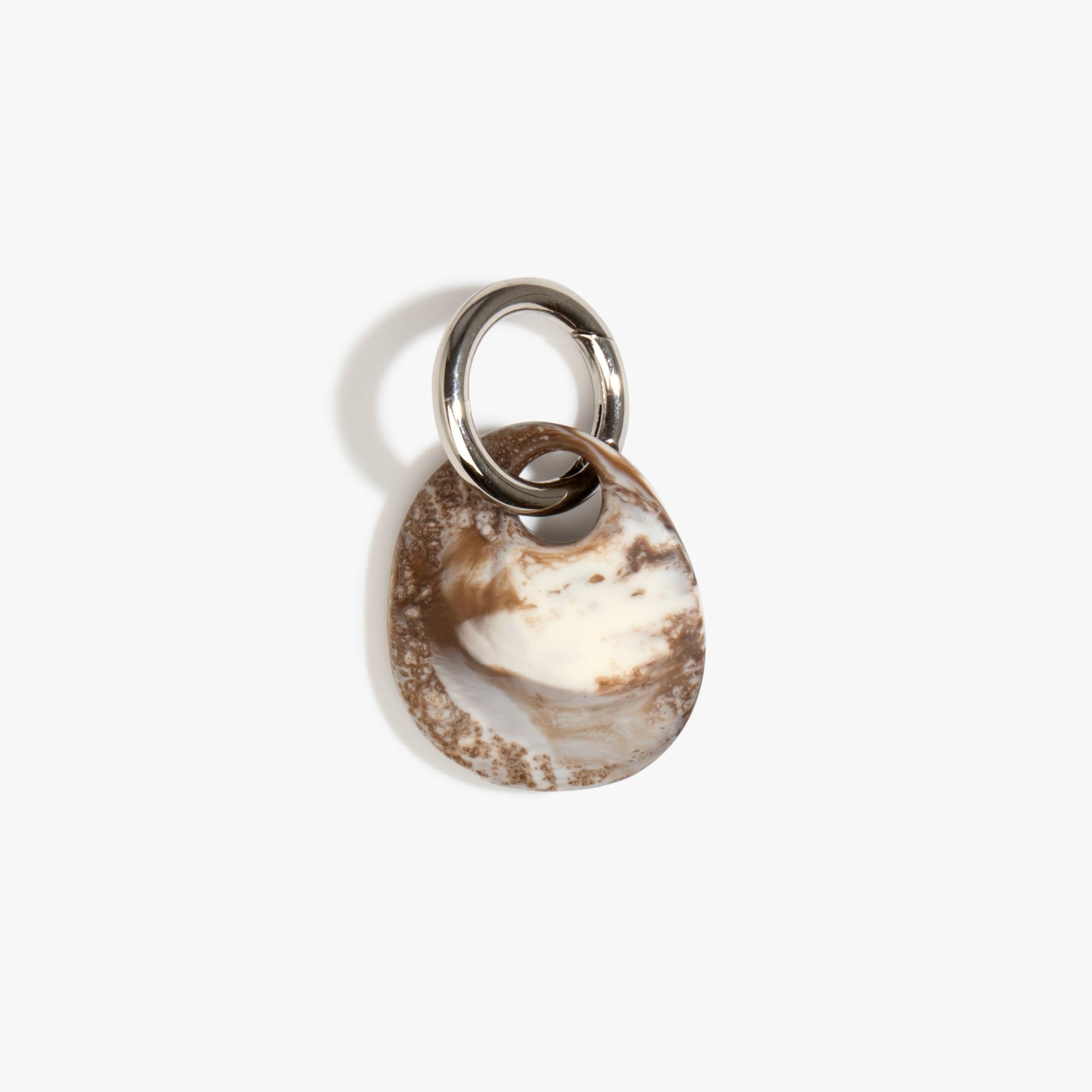 Dinosaur Designs Earth Keyring in Cappuccino — handcrafted marbled brown and Cream resin pebble bead on a polished gunmetal jump ring..