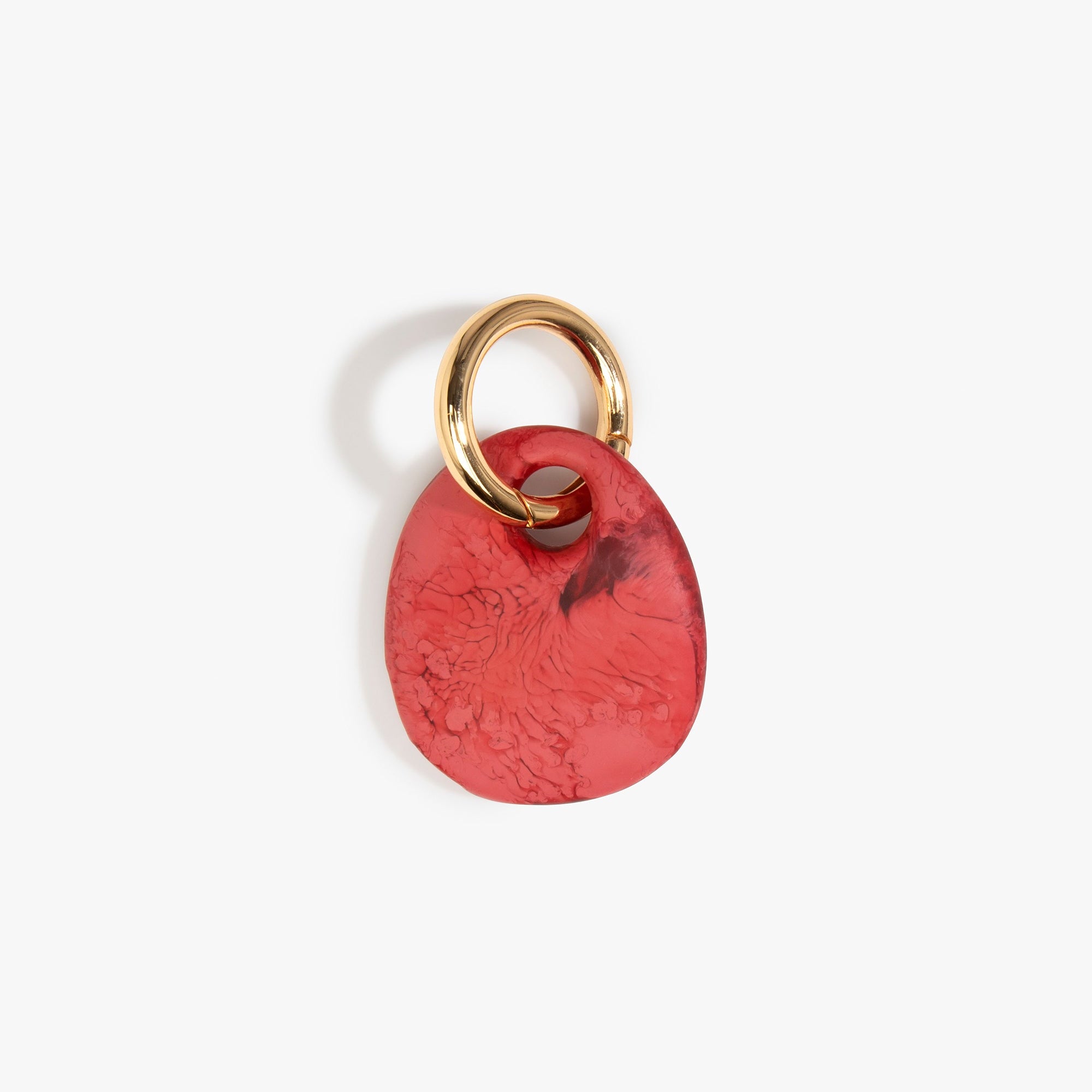 Dinosaur Designs Earth Keyring in Cranberry — handcrafted marbled red resin pebble bead on a polished brass jump ring..