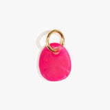 Dinosaur Designs Earth Keyring in Flamingo — handcrafted marbled fuschia pink resin pebble bead on a polished brass jump ring..