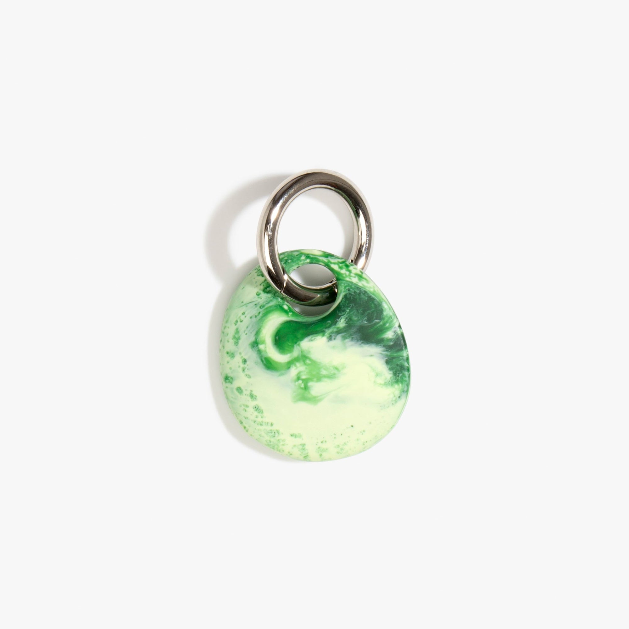 Dinosaur Designs Earth Keyring in Grass — handcrafted marbled light and dark green resin pebble bead on a polished gunmetal jump ring..