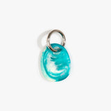 Dinosaur Designs Earth Keyring in Lagoon — handcrafted marbled blue and Cream resin pebble bead on a polished gunmetal jump ring..
