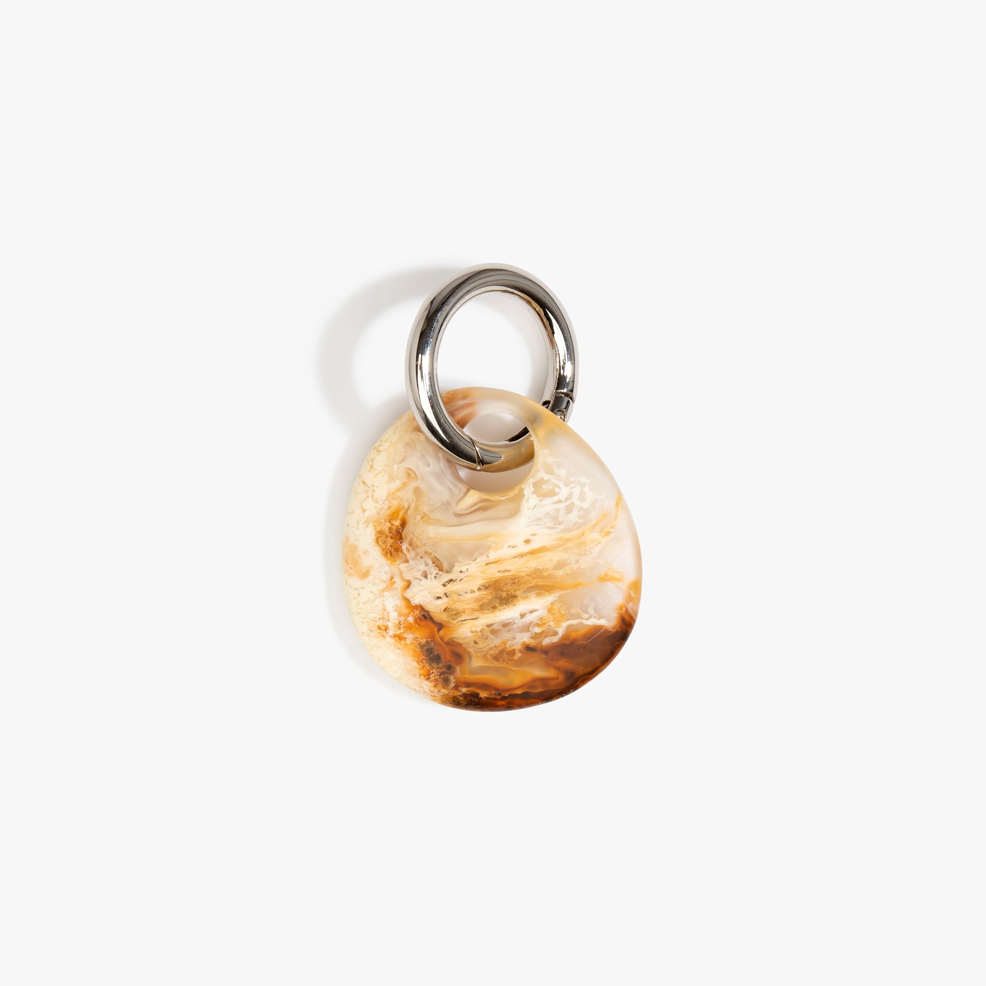 Dinosaur Designs Earth Keyring in Light Horn — handcrafted marbled brown, Cream and clear resin pebble bead on a polished gunmetal jump ring..