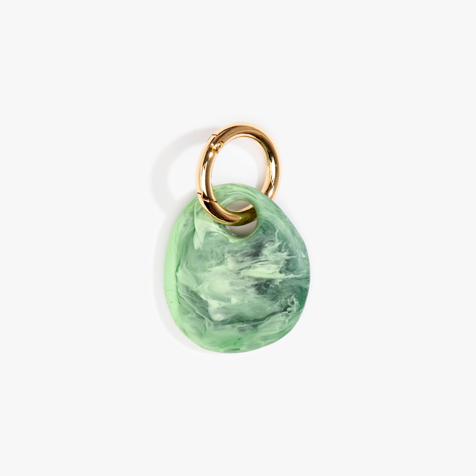 Dinosaur Designs Earth Keyring in Moss — handcrafted marbled green resin pebble bead on a polished brass jump ring..