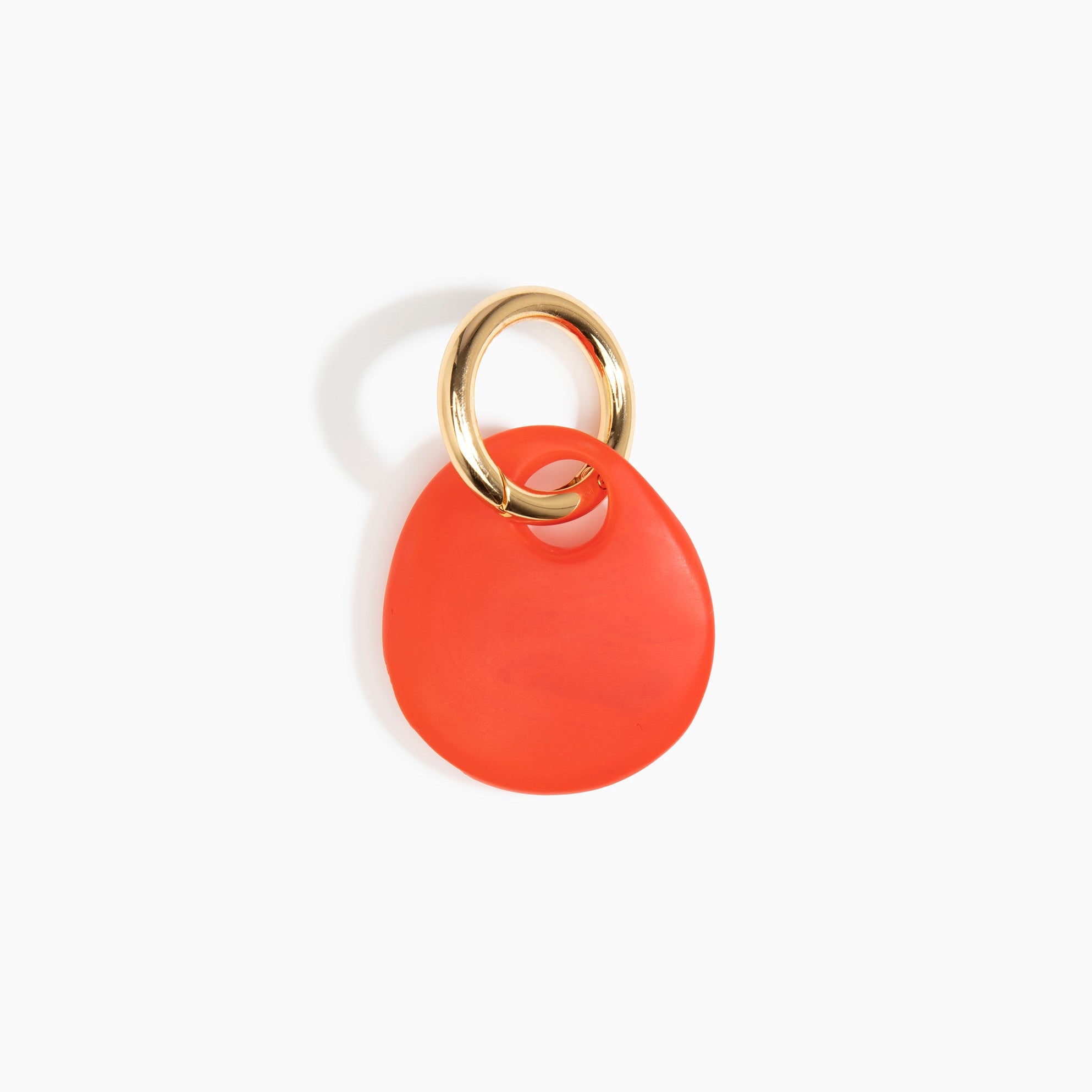 Dinosaur Designs Earth Keyring in Poppy — handcrafted marbled red resin pebble bead on a polished brass jump ring..
