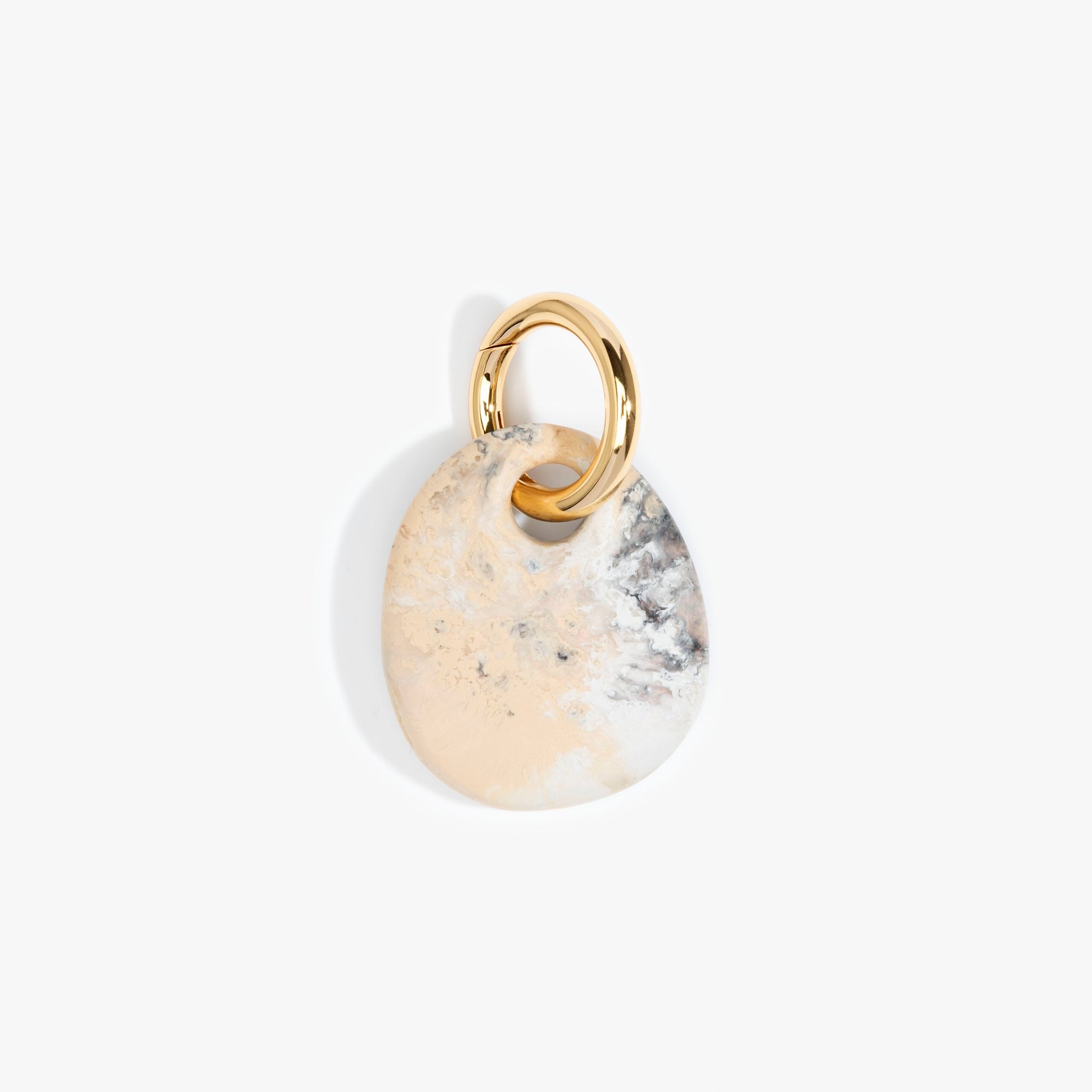 Dinosaur Designs Earth Keyring in Sandy Pearl — handcrafted marbled beige, grey and pearlescent resin pebble bead on a polished brass jump ring..