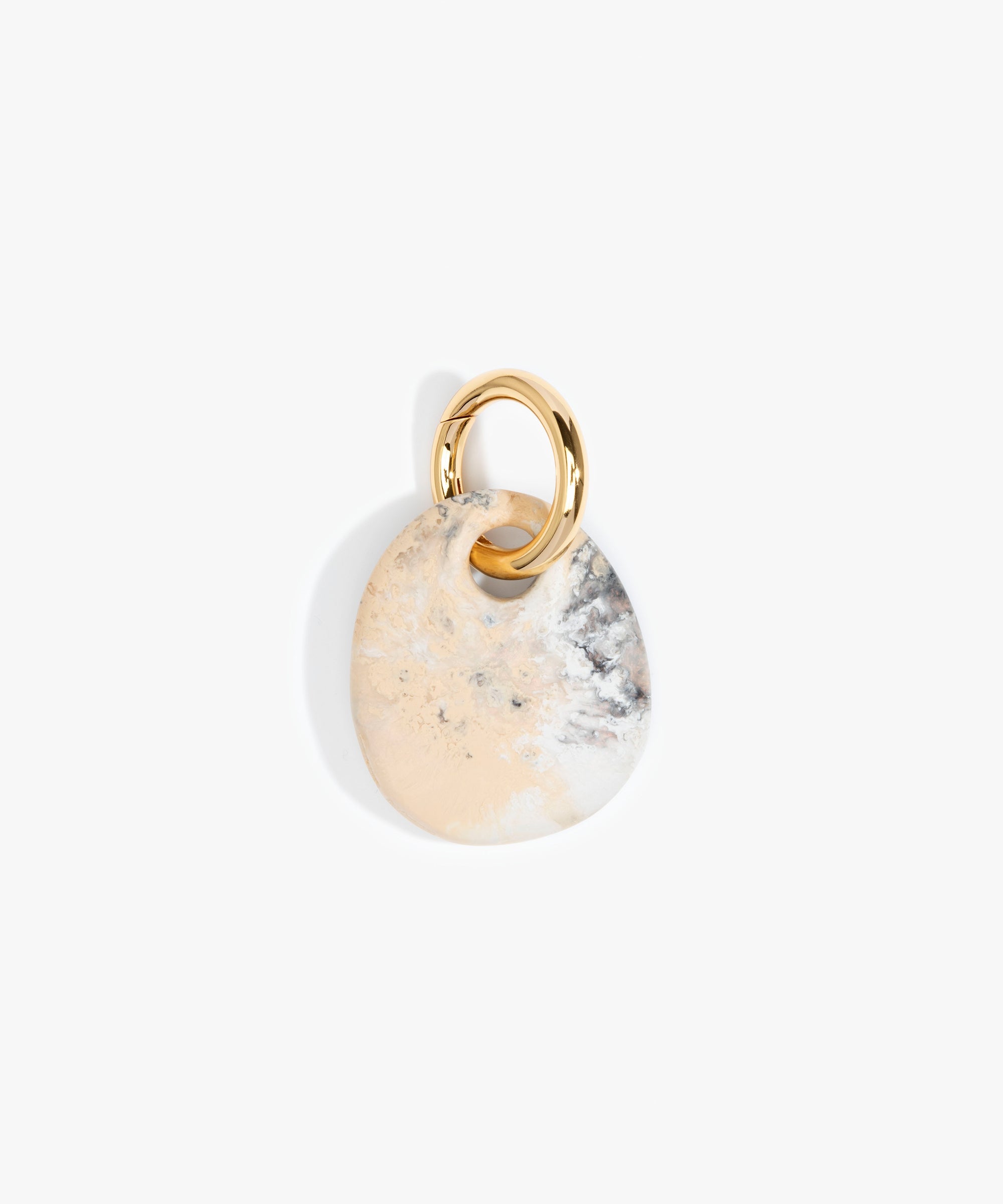 Dinosaur Designs Earth Keyring in Sandy Pearl — handcrafted marbled beige, grey and pearlescent resin pebble bead on a polished brass jump ring..