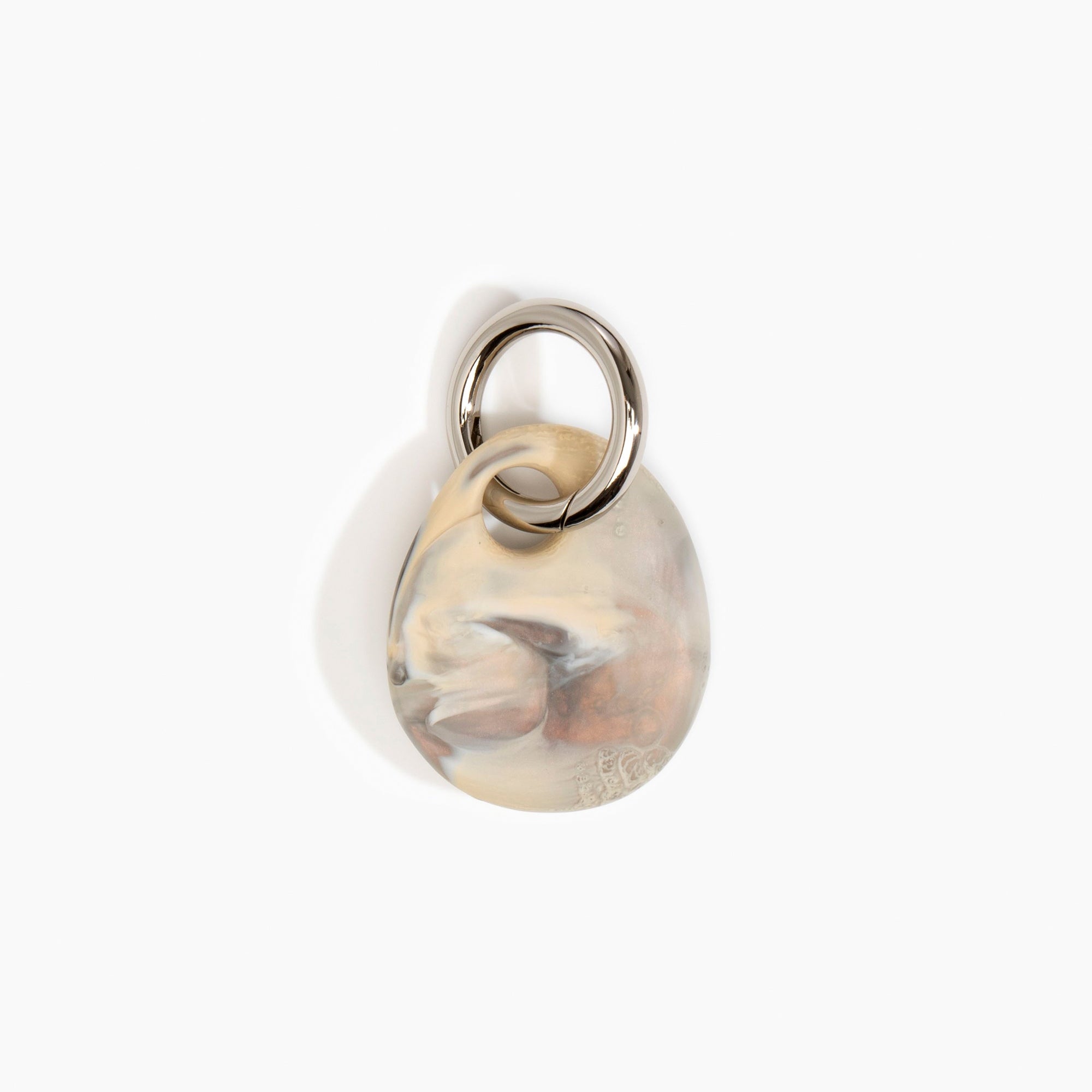 Dinosaur Designs Earth Keyring in Sandy Pearl — handcrafted marbled beige, grey and pearlescent resin pebble bead on a polished gunmetal jump ring..