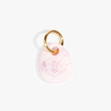 Dinosaur Designs Earth Keyring in Shell Pink — handcrafted marbled pink resin pebble bead on a polished brass jump ring..