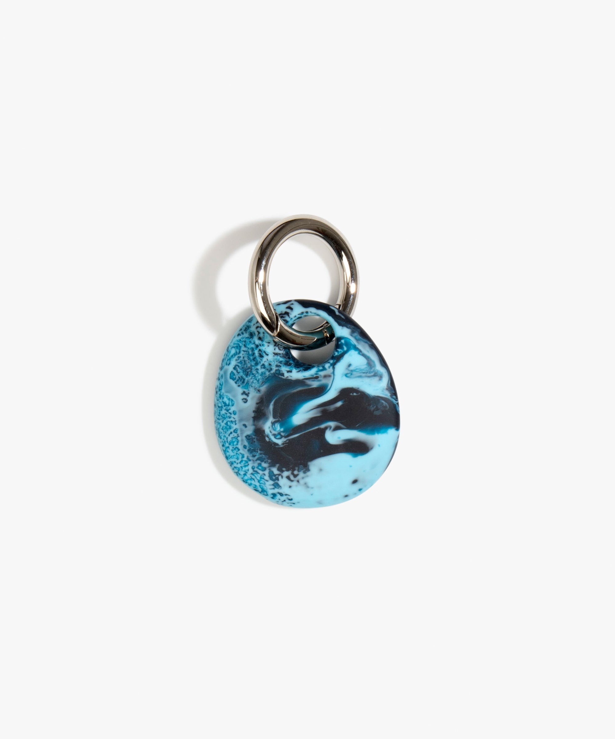 Dinosaur Designs Earth Keyring in Water — handcrafted marbled light and dark blue resin pebble bead on a polished gunmetal jump ring..