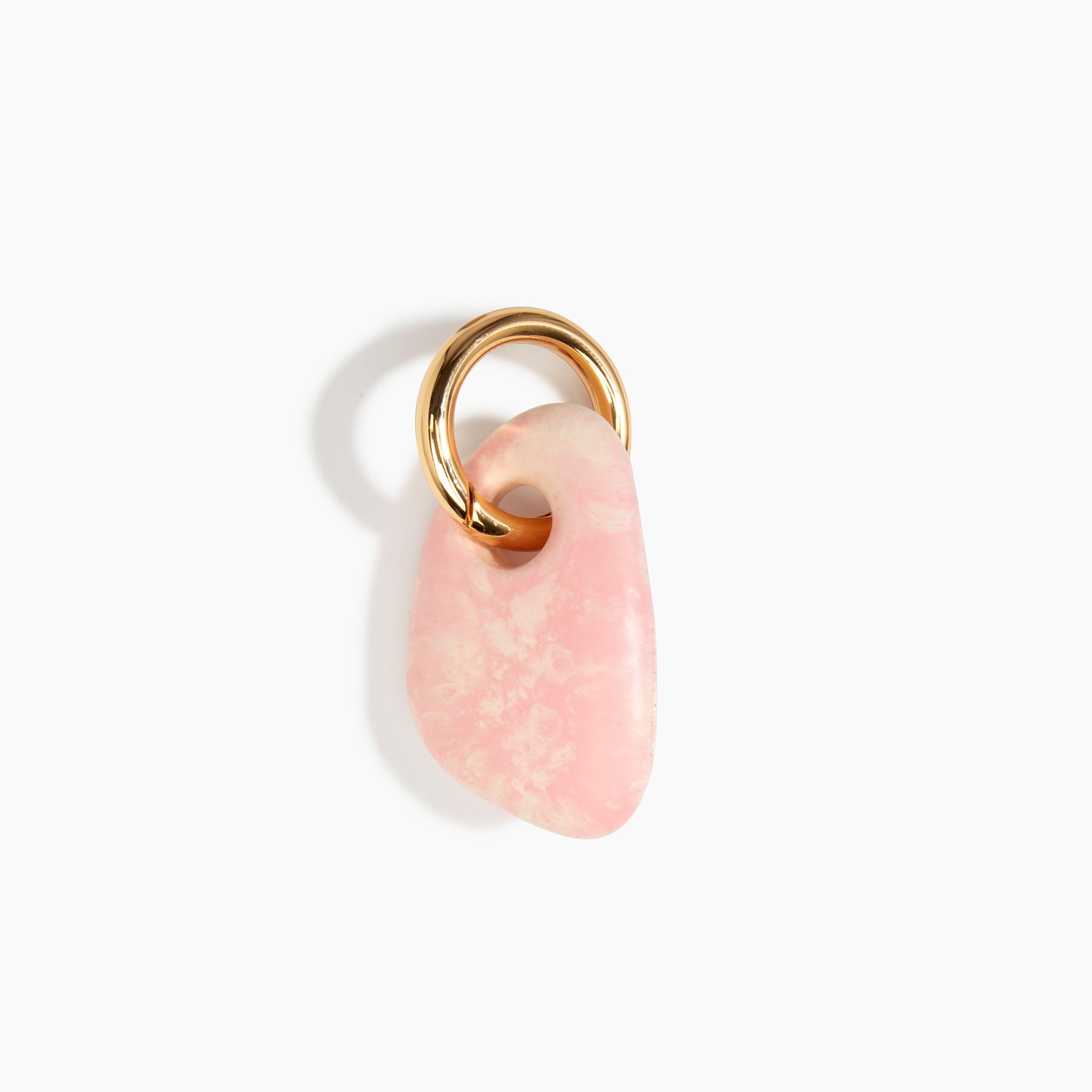Dinosaur Designs Rock Keyring in Blossom — handcrafted marbled pale pink resin pebble bead on a polished brass jump ring..