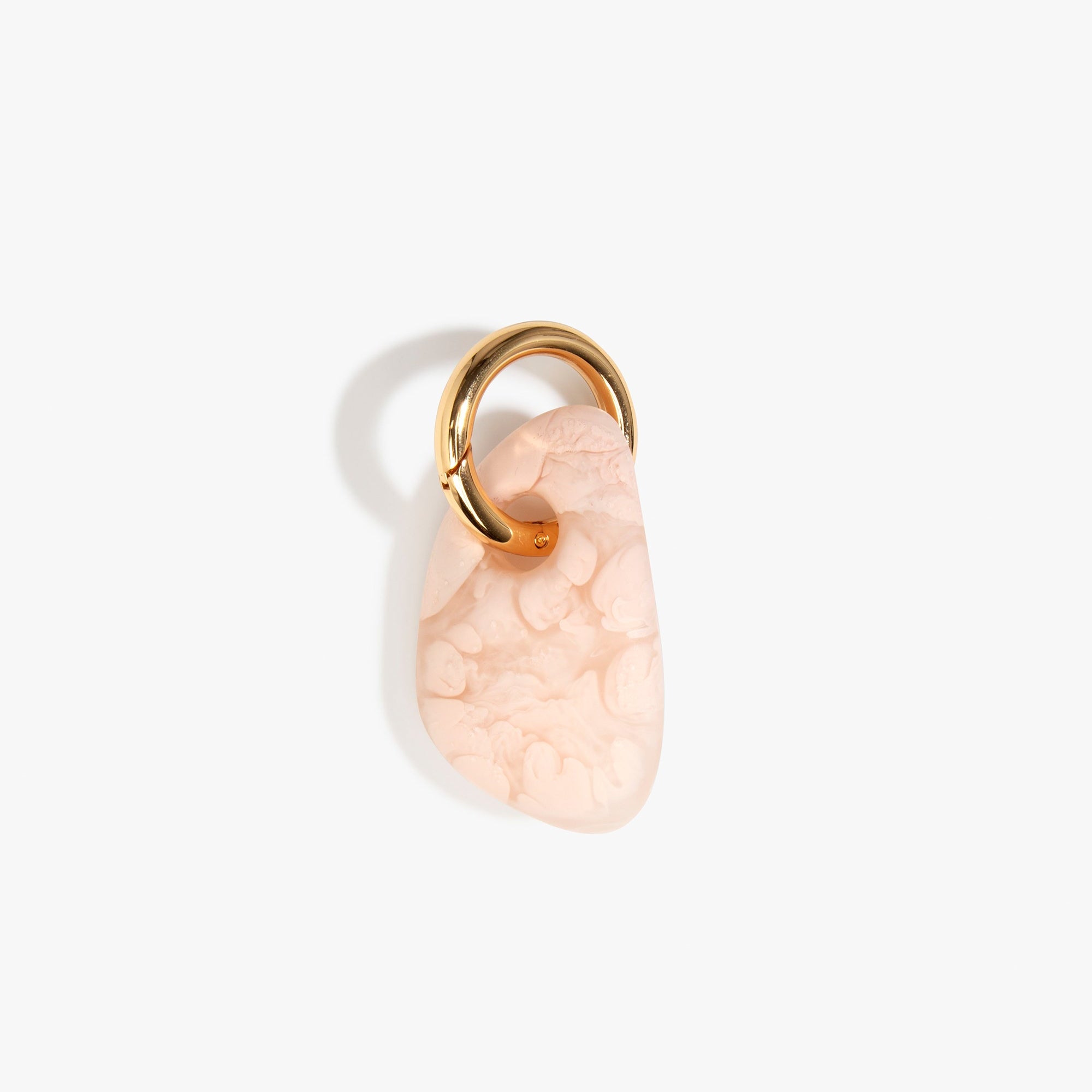 Dinosaur Designs Rock Keyring in Rose Swirl — handcrafted pink resin pebble bead on a polished brass jump ring..