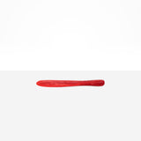 Dinosaur Designs Temple Cake Knife in Cranberry — handcrafted marbled red resin cake knife with smooth tapered blade and rounded handle.
