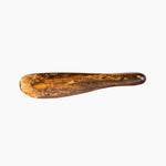 Dinosaur Designs Temple Cake Knife in Dark Horn — handcrafted marbled brown, black and gold resin cake knife with smooth tapered blade and rounded handle.