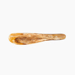 Dinosaur Designs Temple Cake Knife in Light Horn — handcrafted marbled brown, cream and clear resin cake knife with smooth tapered blade and rounded handle.