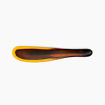 Dinosaur Designs Temple Cake Knife in Tortoise — handcrafted marbled amber and black resin cake knife with smooth tapered blade and rounded handle.