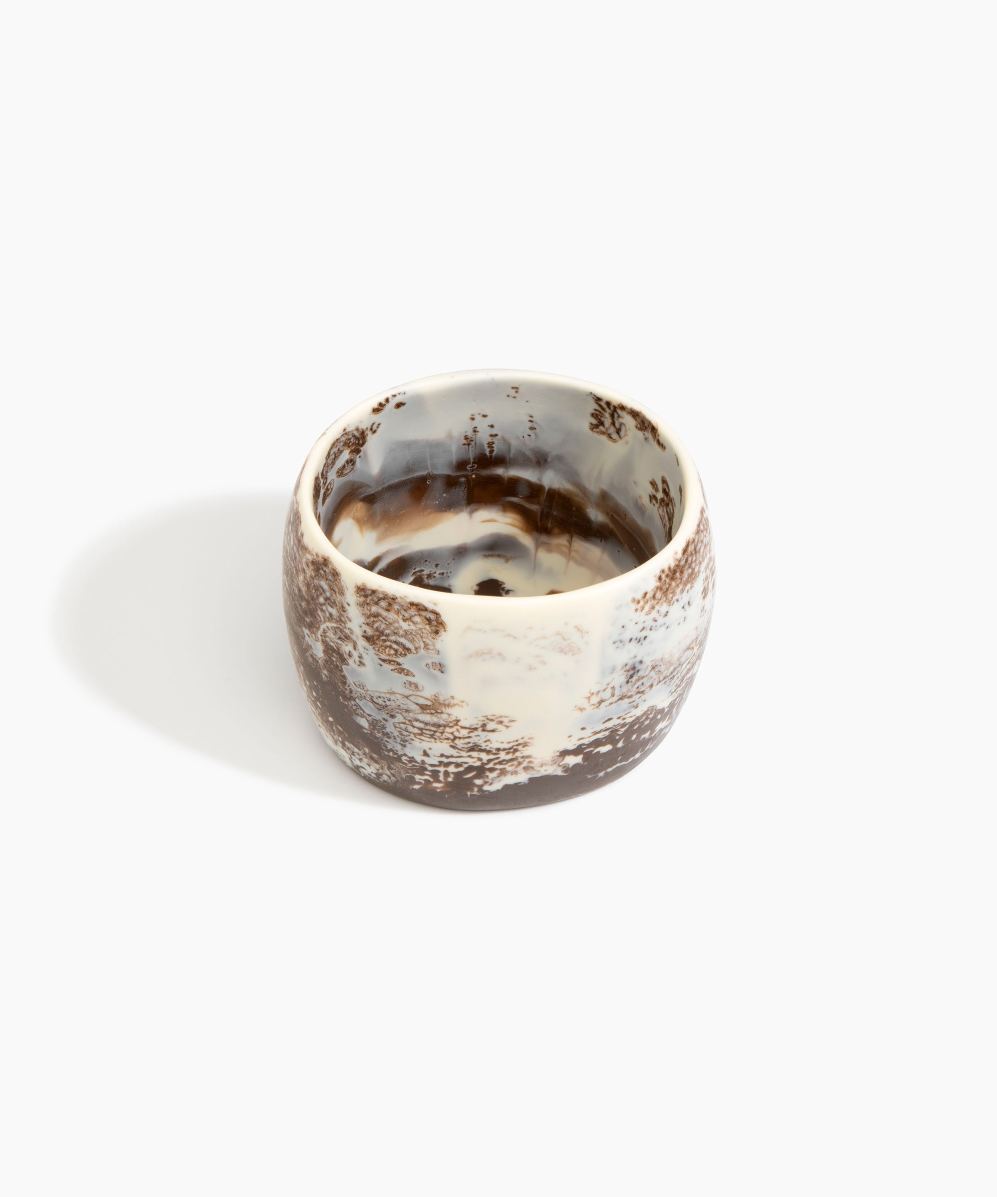 Dinosaur Designs Rock Totem Vase in Cappuccino — handcrafted pink marbled resin vase with organic silhouette...