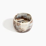 Dinosaur Designs Rock Totem Vase in Cappuccino — handcrafted pink marbled resin vase with organic silhouette..