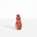 Dinosaur Designs Tall Pepper Boulder Grinder in Rust — handcrafted marbled terracotta red and cream resin pepper grinder with elongated teardrop body and stacked pebble lid