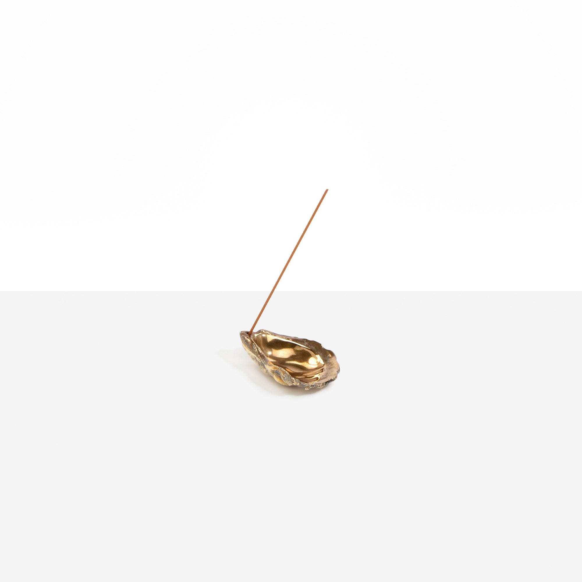 Corey Ashford Oyster Incense Holder in Brass — polished brass cast metal oyster shell incense holder for single stick.