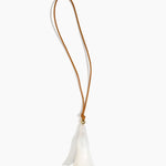 Dinosaur Designs Long Flower Bag Charm in Chalk Swirl colour with Brass bead — handcrafted marbled off-white resin bell-shaped flower bag charm with tan leather hanging loop and brass bead
