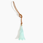 Dinosaur Designs Long Flower Bag Charm in Mint colour with Brass bead — handcrafted marbled mint blue resin bell-shaped flower bag charm with tan leather hanging loop and brass bead