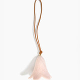 Dinosaur Designs Flower Decoration in Rose Swirl colour with Brass bead — handcrafted marbled dusty pink resin bell-shaped flower ornament with tan leather hanging loop and brass bead