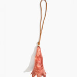 Dinosaur Designs Long Flower Decoration in Rust colour with Brass bead — handcrafted marbled terracotta red and cream resin bell-shaped flower ornament with tan leather hanging loop and brass bead