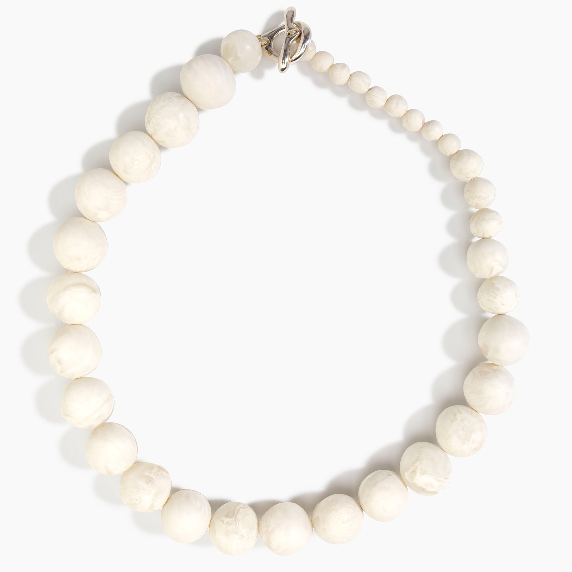 Dinosaur Designs Organic Ball Necklace in Chalk Swirl — handcrafted marbled off-white resin graduating bead necklace with silver t-bar clasp.