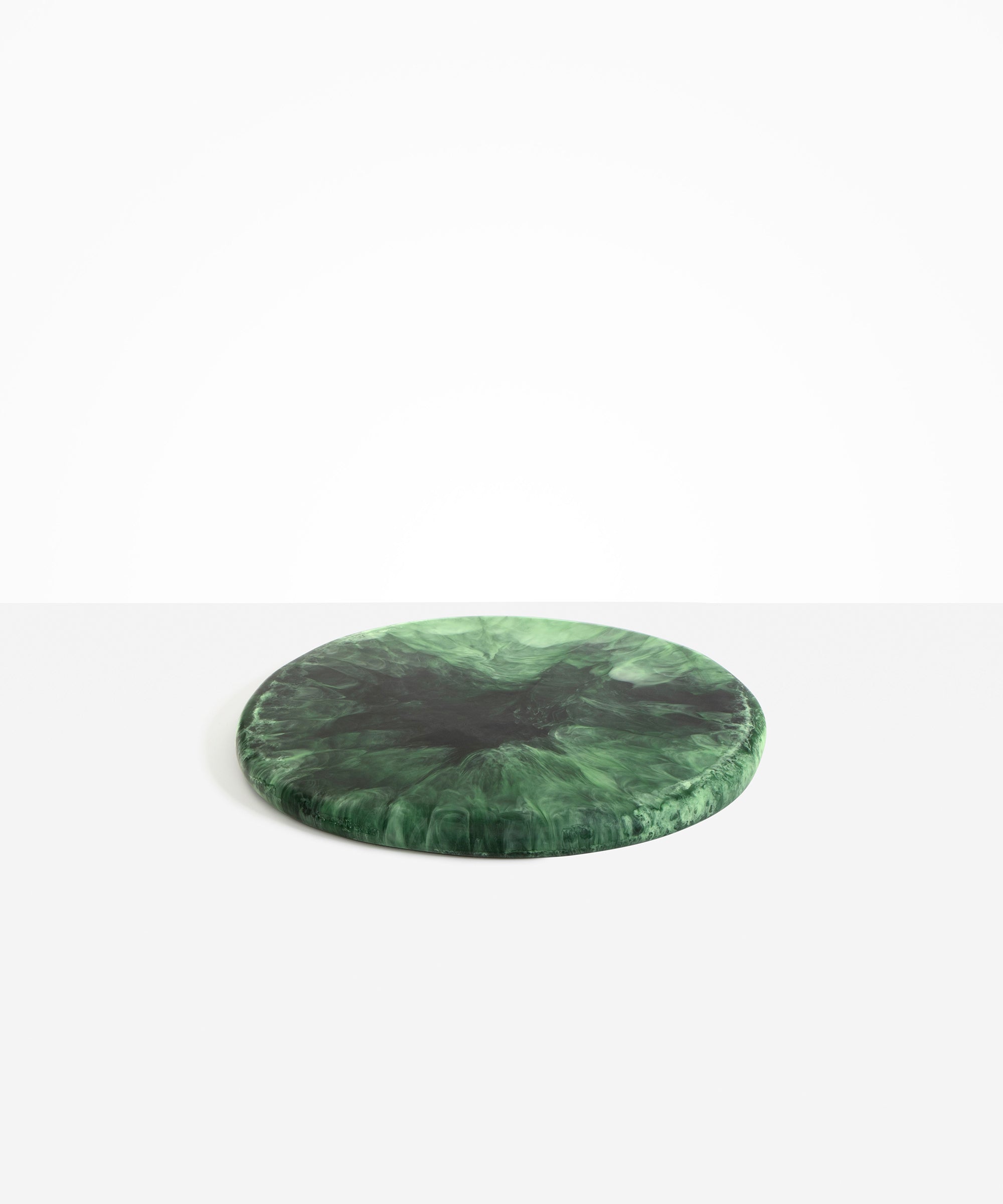 Dinosaur Designs Temple Cheese Platter in Moss — handcrafted marbled green resin round serving board with organic edge and recessed handles..