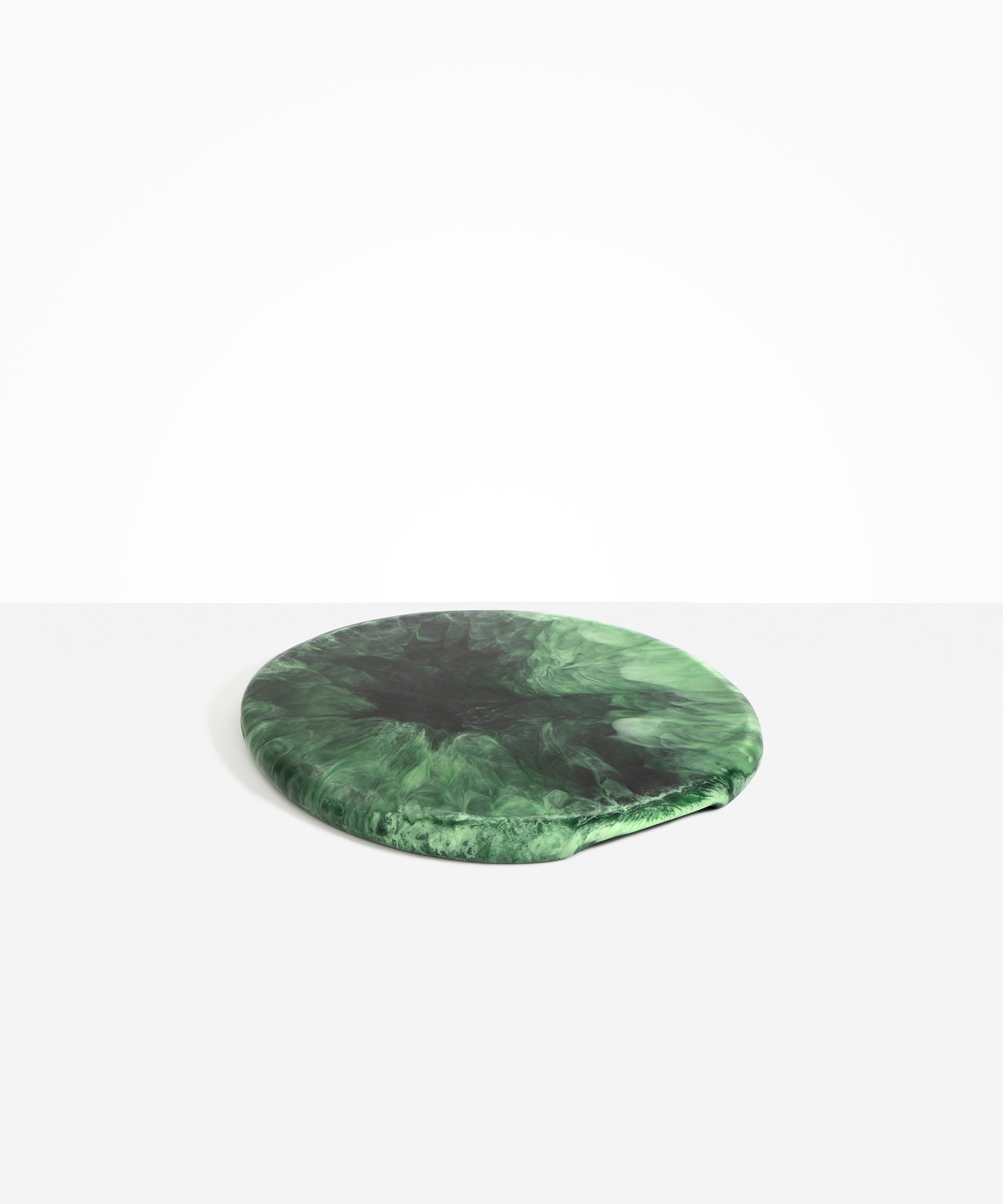 Dinosaur Designs Temple Cheese Platter in Moss — handcrafted marbled green resin round serving board with organic edge and recessed handles..