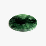 Dinosaur Designs Temple Cheese Platter in Moss — handcrafted marbled green resin round serving board with organic edge and recessed handles..