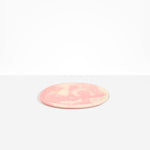 Dinosaur Designs Rock Plate in Blossom — handcrafted marbled pink and cream resin oval flat serving plate with rounded organic edge