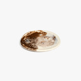 Dinosaur Designs Rock Plate in Cappuccino — handcrafted marbled brown and cream resin oval flat serving plate with rounded organic edge