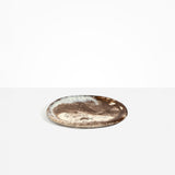 Dinosaur Designs Rock Plate in Cappuccino — handcrafted marbled brown and cream resin oval flat serving plate with rounded organic edge