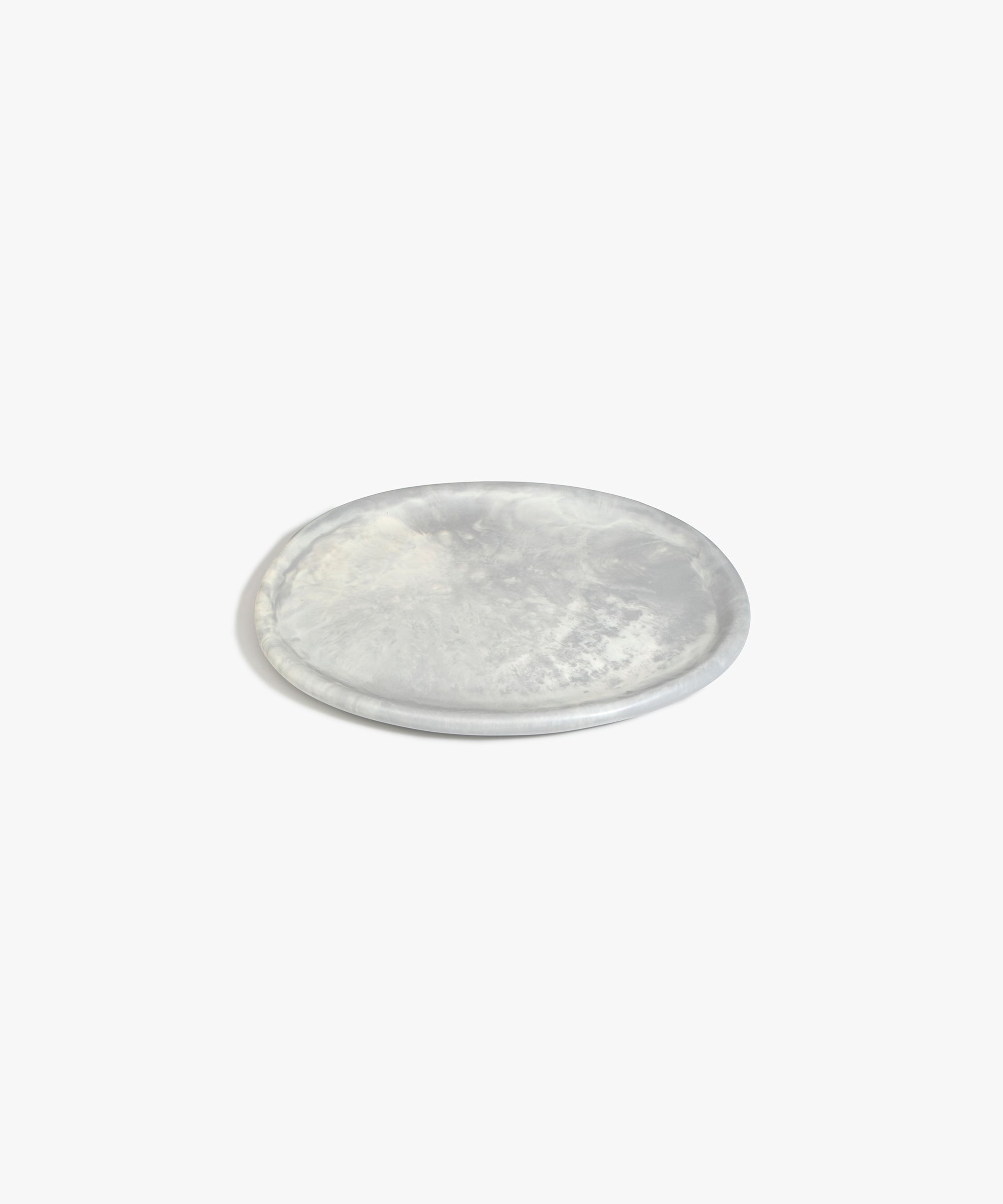 Dinosaur Designs Rock Plate in Cloud — handcrafted marbled grey and cream resin oval flat serving plate with rounded organic edge