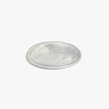 Dinosaur Designs Rock Plate in Cloud — handcrafted marbled grey and cream resin oval flat serving plate with rounded organic edge..