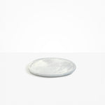 Dinosaur Designs Rock Plate in Cloud — handcrafted marbled grey and cream resin oval flat serving plate with rounded organic edge