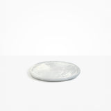 Dinosaur Designs Rock Plate in Cloud — handcrafted marbled grey and cream resin oval flat serving plate with rounded organic edge