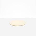 Dinosaur Designs Rock Plate in Cream — handcrafted cream resin oval flat serving plate with rounded organic edge