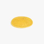 Dinosaur Designs Rock Plate in Pollen — handcrafted marbled yellow resin oval flat serving plate with rounded organic edge