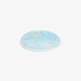Dinosaur Designs Rock Plate in Pool — handcrafted marbled blue resin oval flat serving plate with rounded organic edge