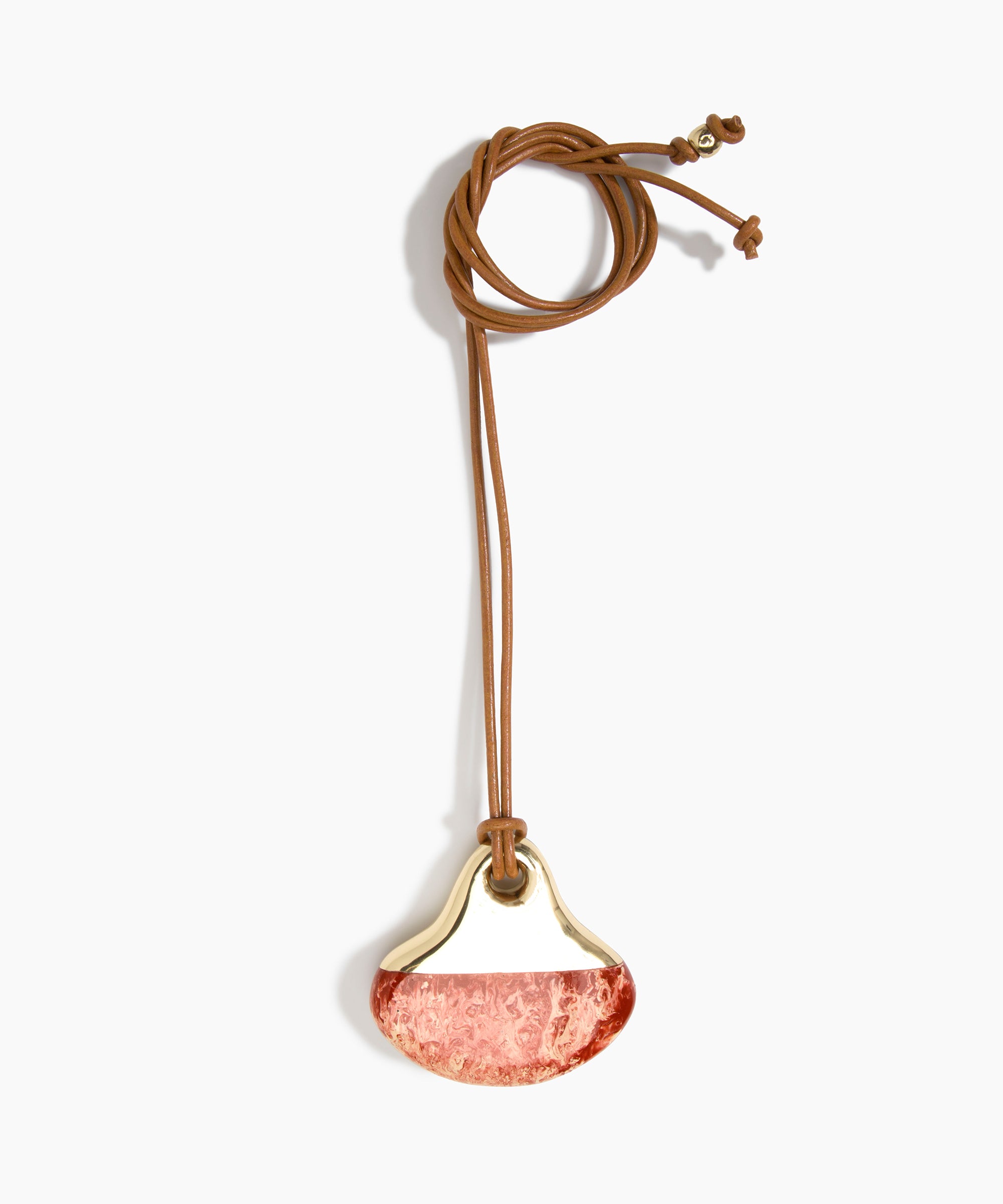 Dinosaur Designs Large Polished Lotus Pendant on Leather in Rust with Brass hardware — marbled brown-red and cream resin half-crescent pendant with polished brass setting on an adjustable tan leather cord